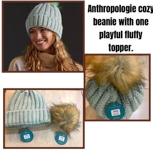 Anthropologie cozy beanie with one playful fluffy topper.